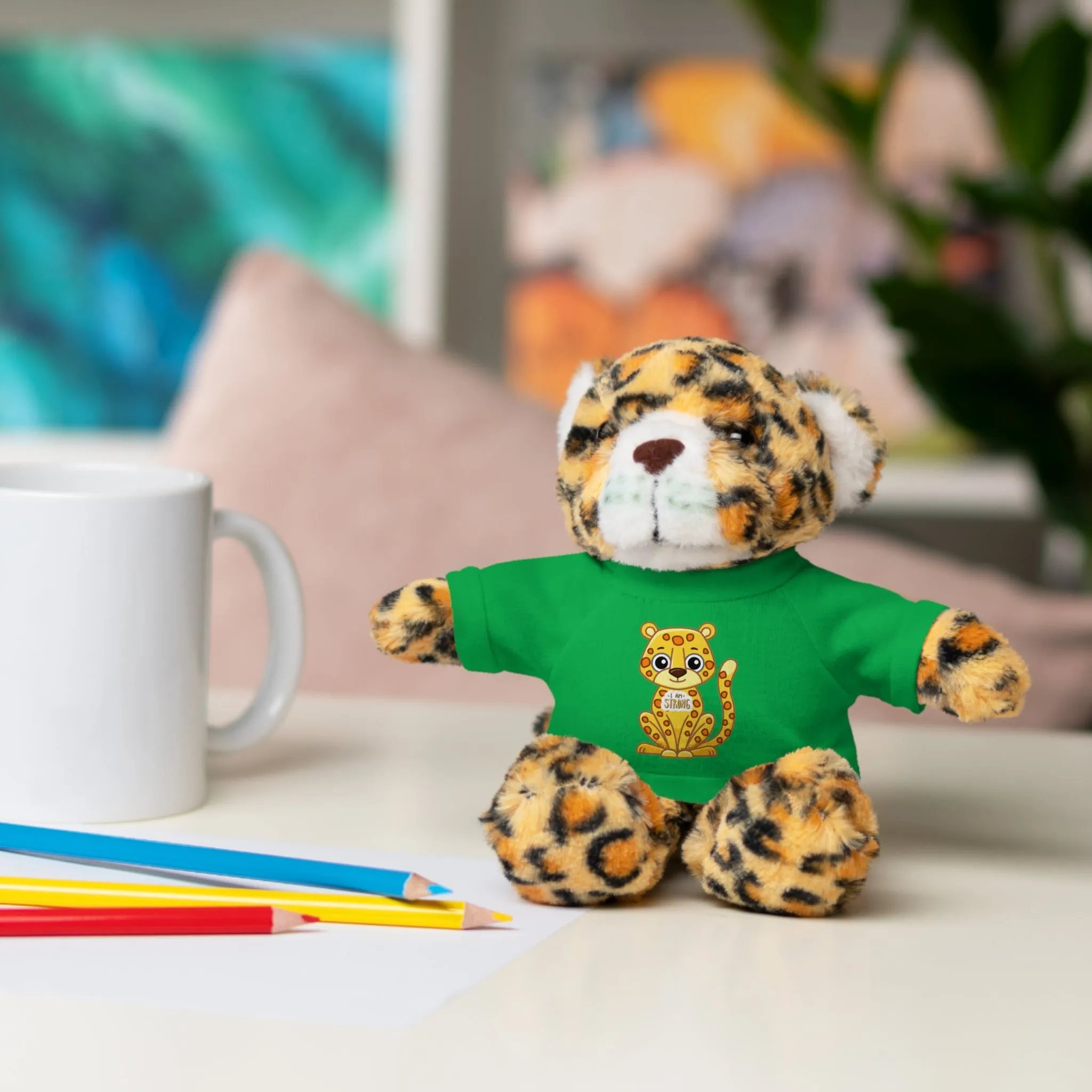 Jaguar Stuffie wears a shirt with a Jaguar 'I am Strong' Cool Stuff Stuffies