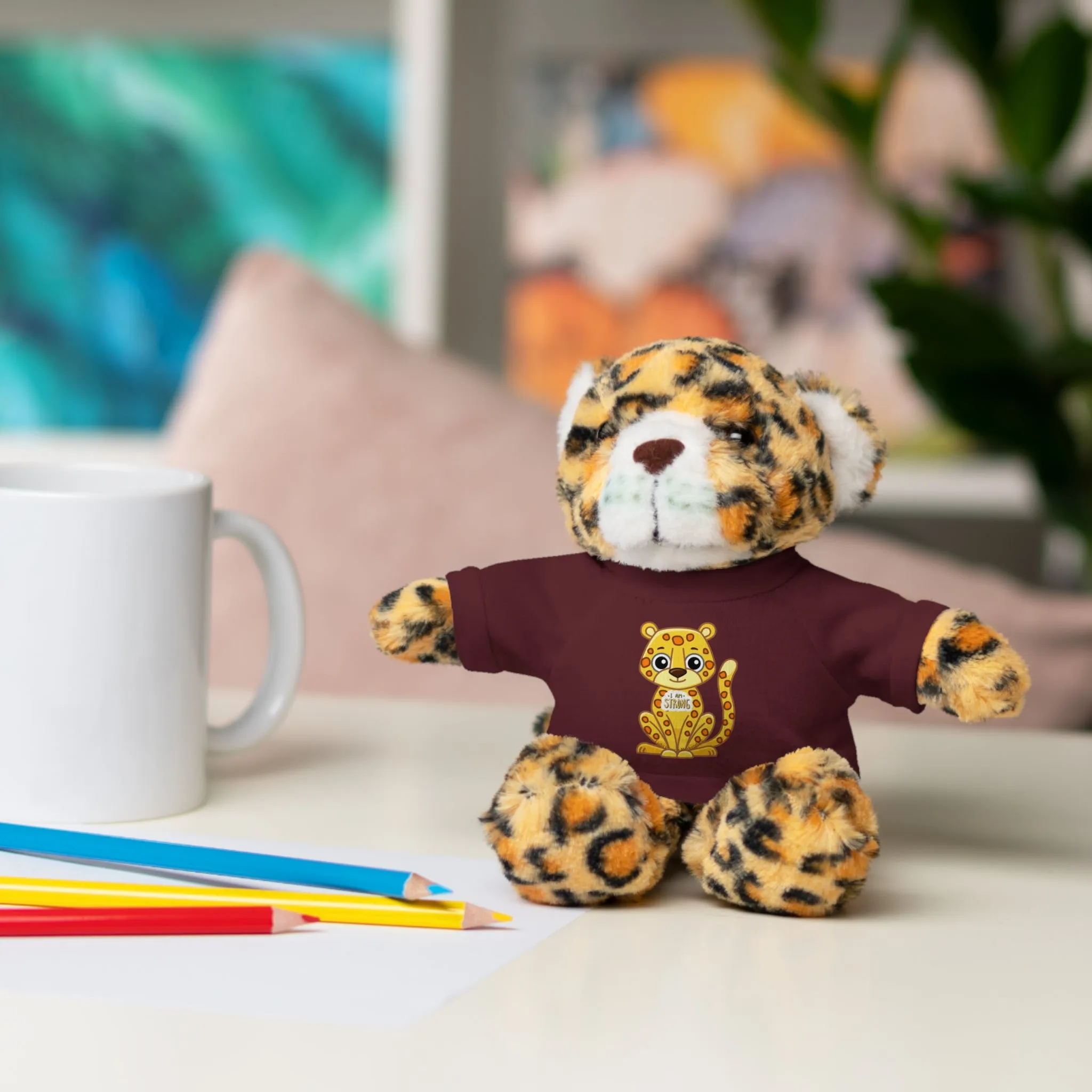 Jaguar Stuffie wears a shirt with a Jaguar 'I am Strong' Cool Stuff Stuffies